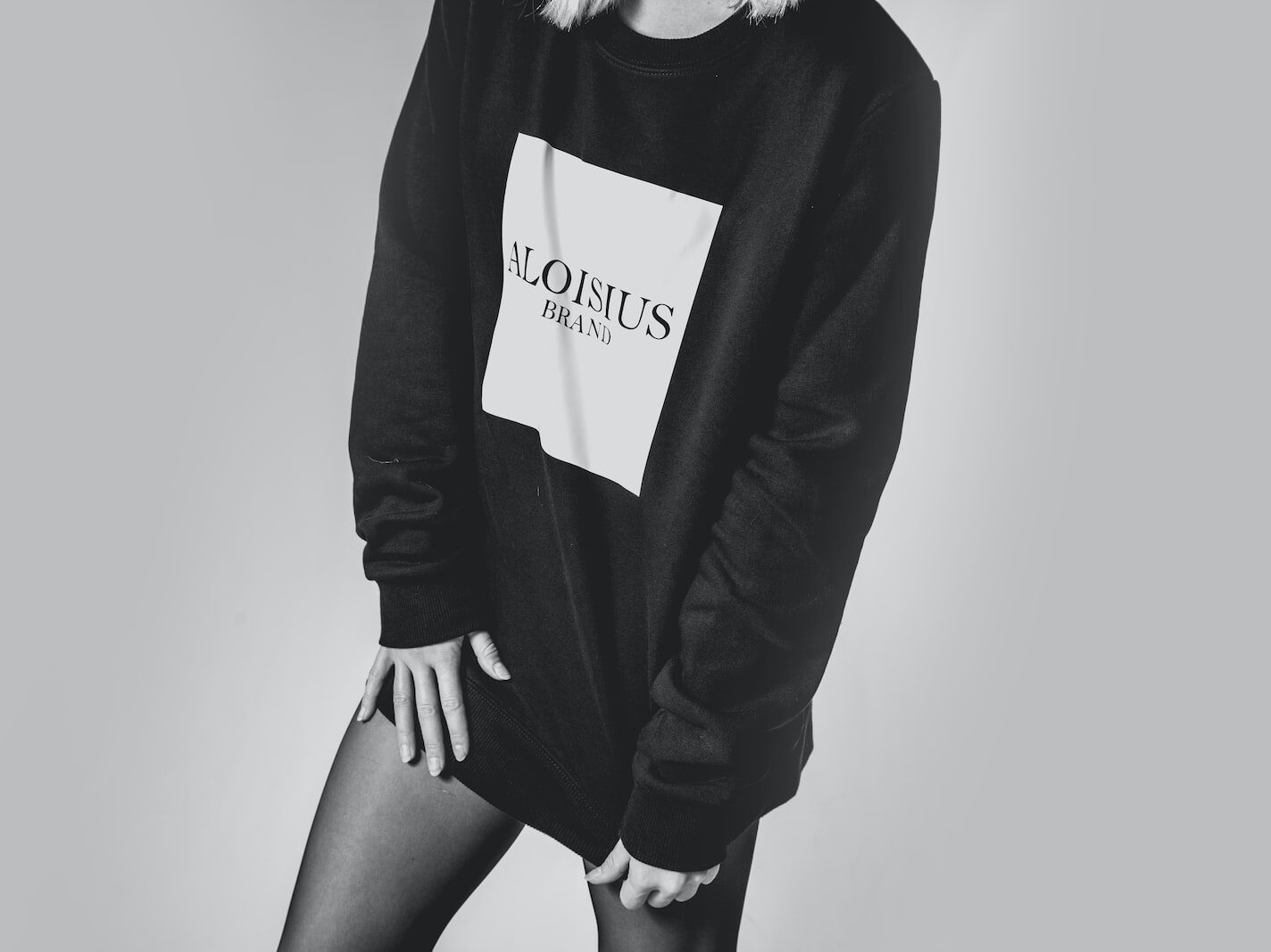 grayscale woman in long-sleeved shirt