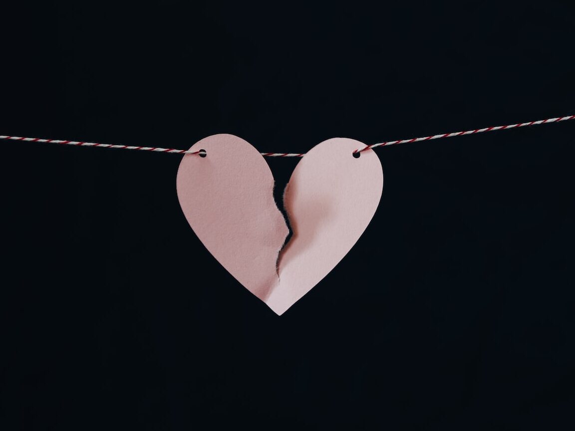 broken heart hanging on wire