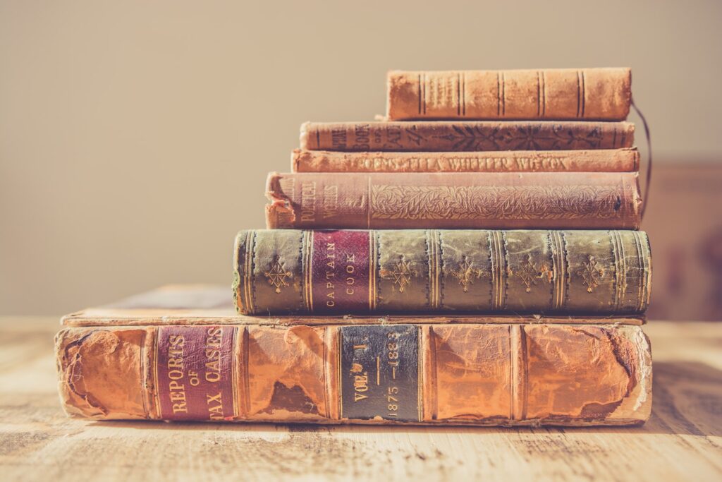 - ČasProŽeny.cz shallow focus photography of stack of books