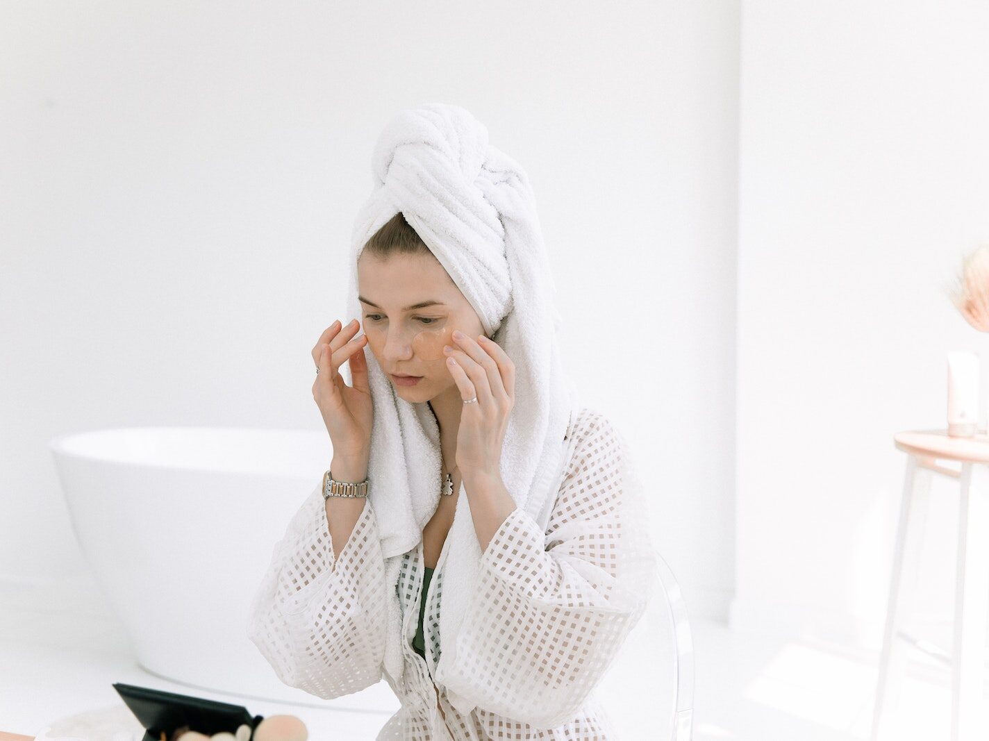 Photo Of Woman Touching Her Face