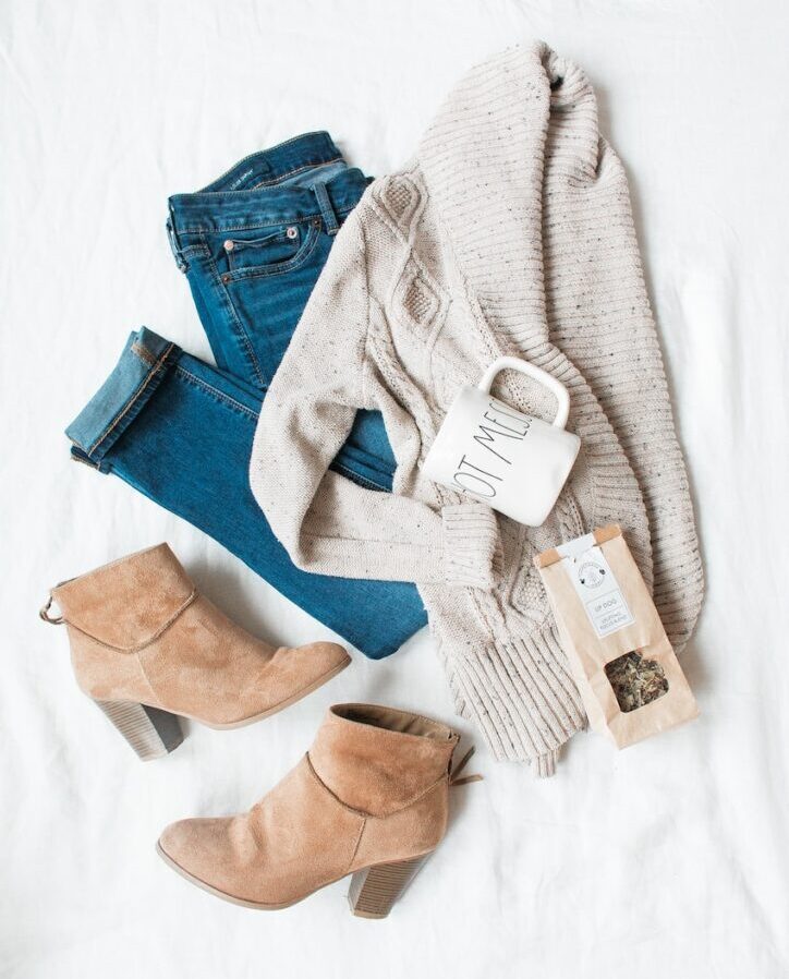 gray cardigan, blue jeans, and pair of brown chunky heeled shoes
