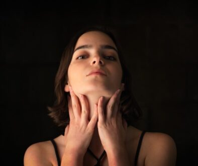 woman in black spaghetti strap top