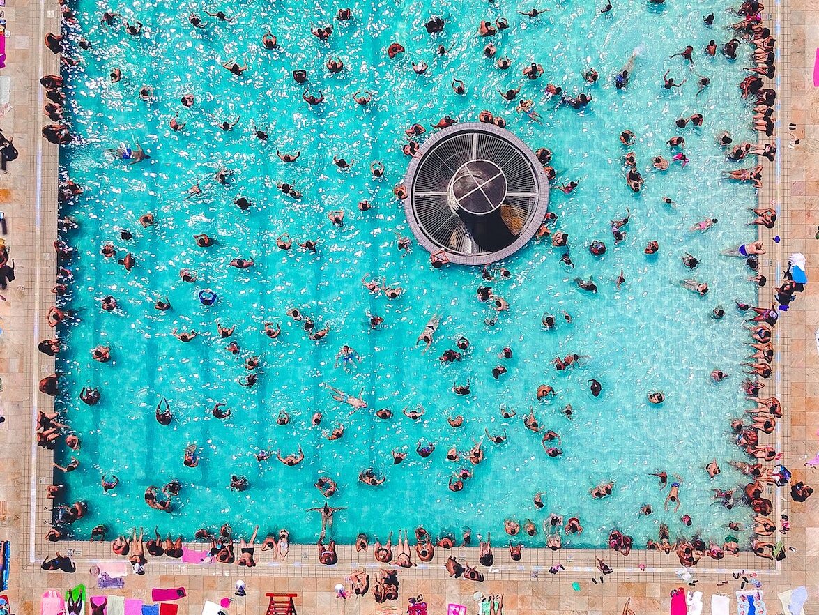 People Swimming At The Pool