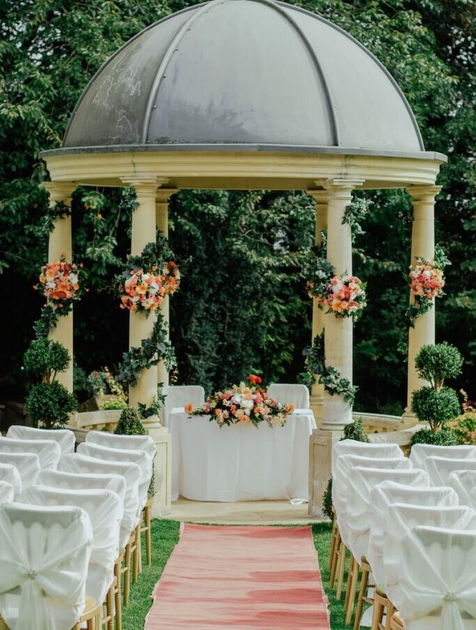 gray and beige gazebo near green leafed tree