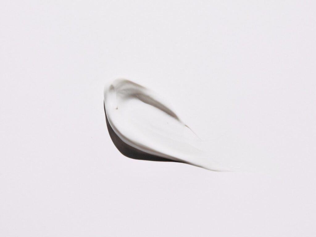 stainless steel spoon on white surface