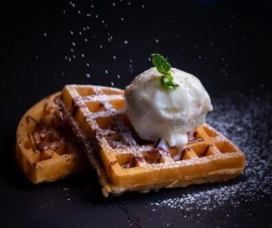 close-up photo of waffle with white ice cream
