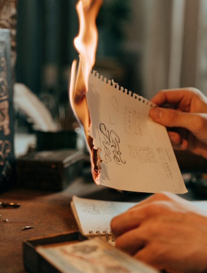 Person Holding White Printer Paper