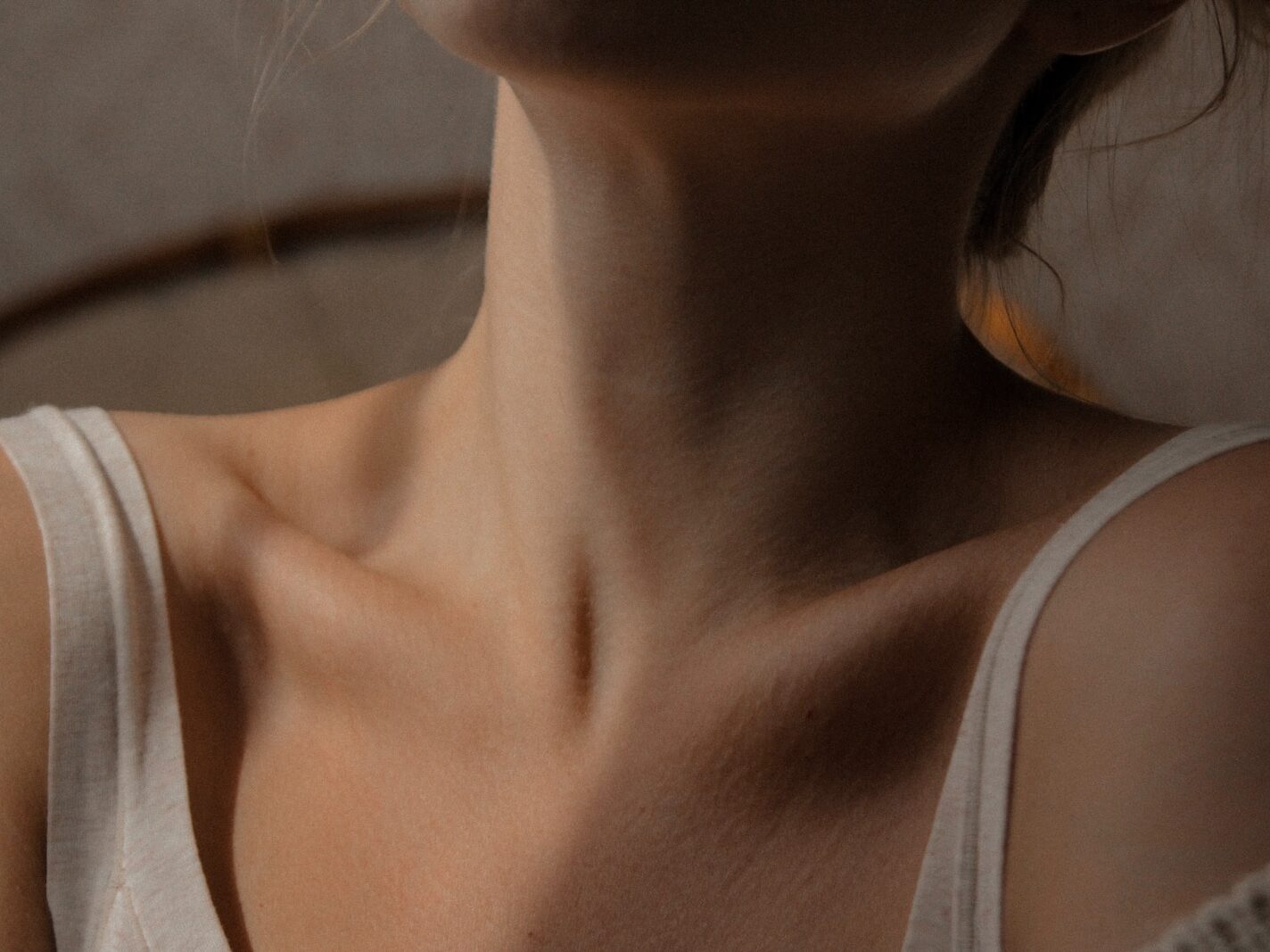 woman in white tank top