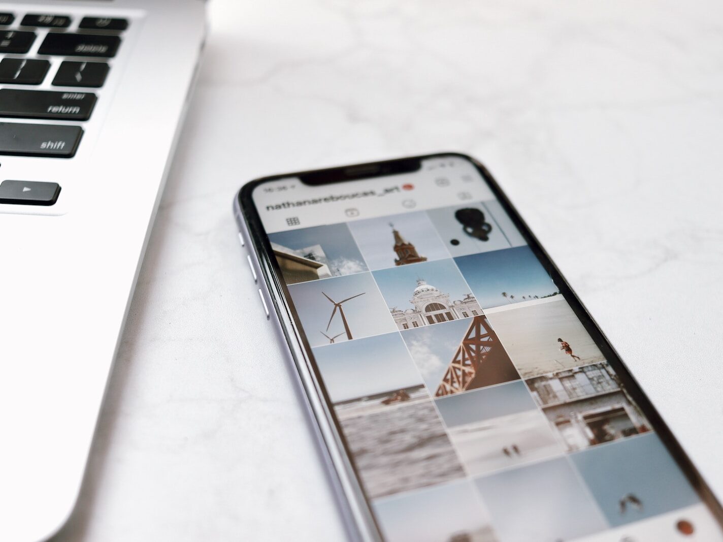 black android smartphone on white table