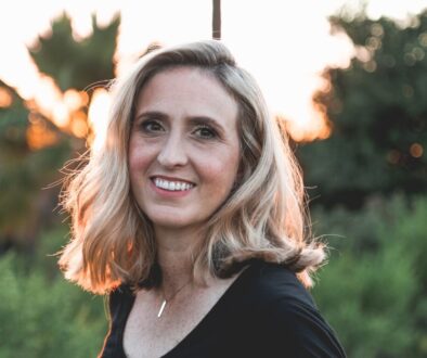 smiling woman in shallow focus photography