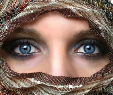 woman with brown and black hijab