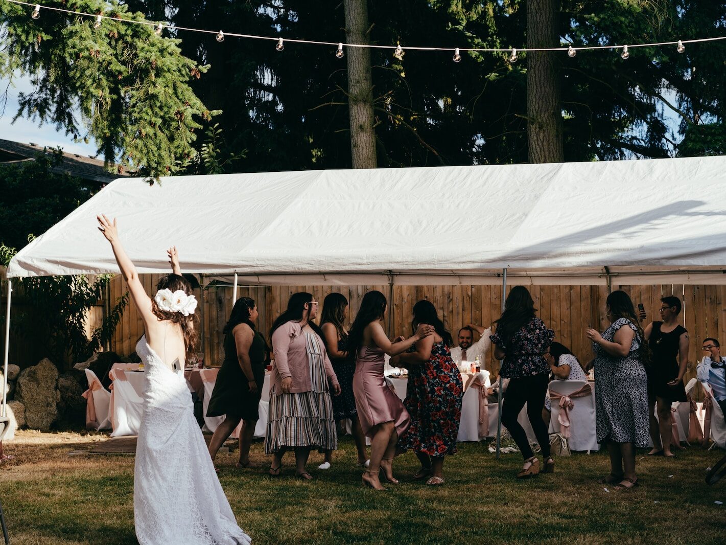 people standing on green grass field during daytime