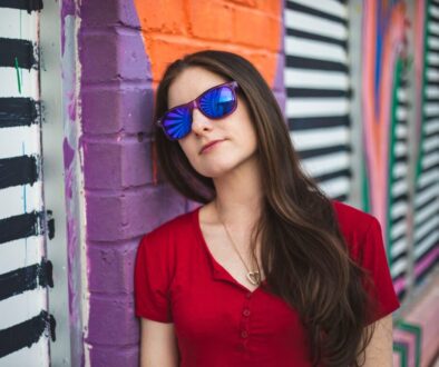 woman leaning on wall