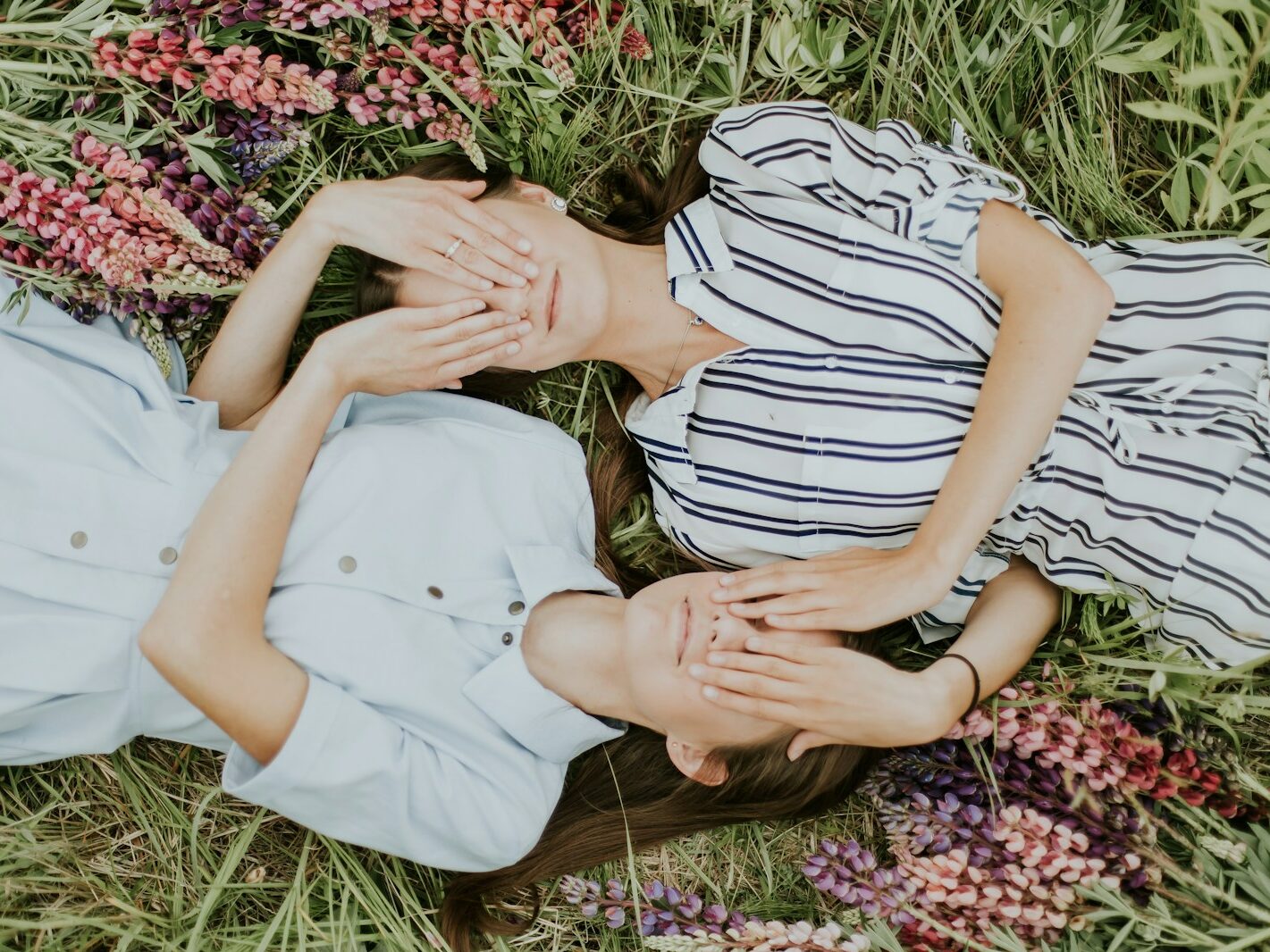 photo of women covering their eyes