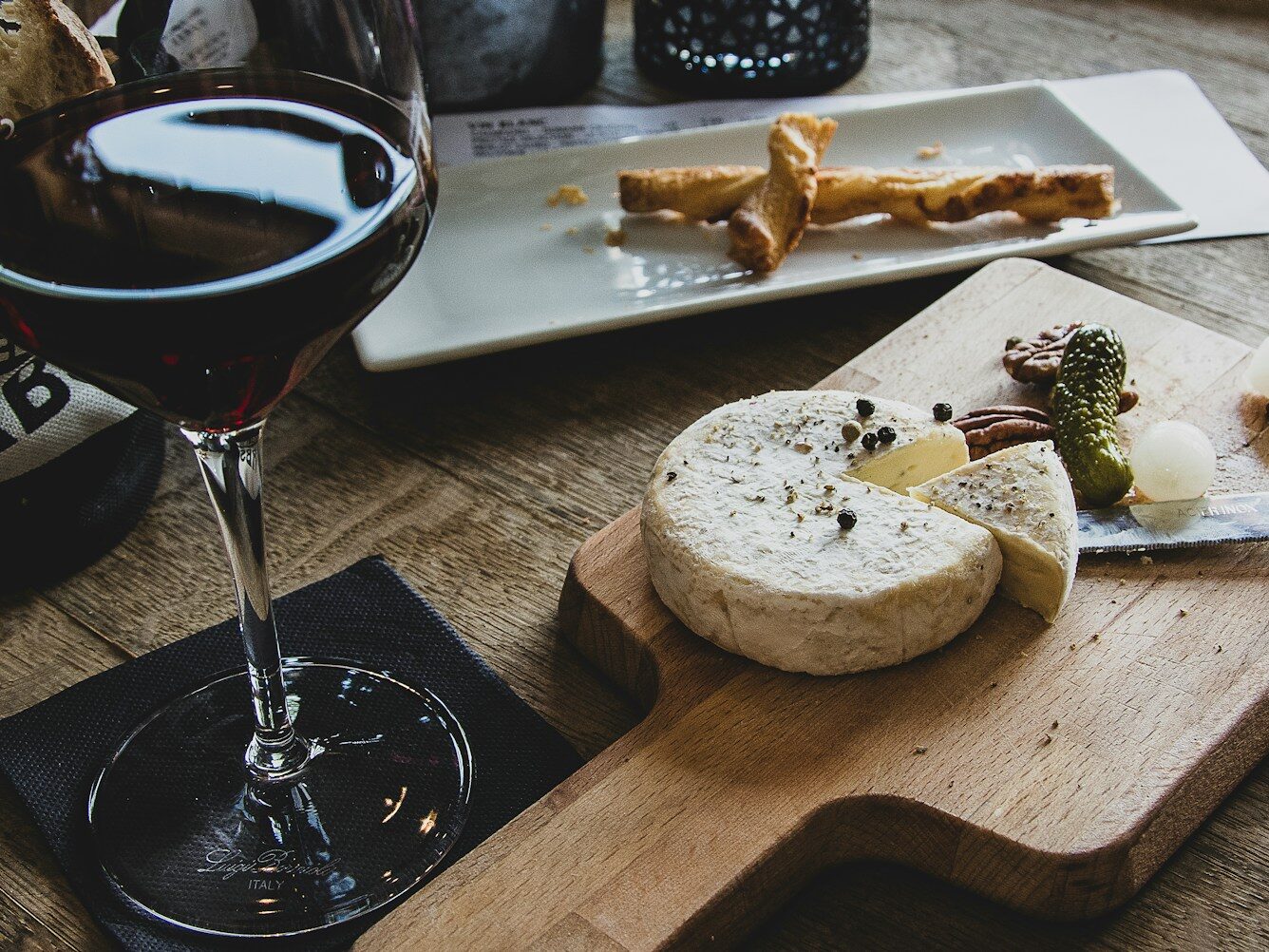 clear martini glass on brown surface