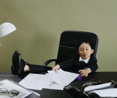 A Young Girl Sitting in the Office